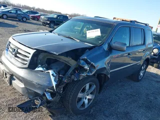 2012 Honda Pilot Touring with VIN 5FNYF3H9XCB042090, listed as a IAAI auction lot 41751359 with 140,424 mi miles and . Bid and sale history available at carsss.com. Image 17.