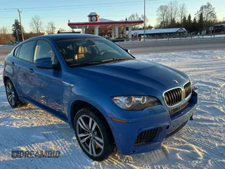 2013 BMW X6 M with VIN 5YMGZ0C57DLL29849, listed as a Copart auction lot 86665844 with 117,000 mi miles and Clean Title. Bid and sale history available at carsss.com. Image 1.