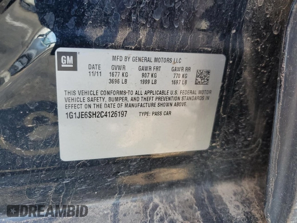 2012 Chevrolet Sonic LTZ z VIN 1G1JE6SH2C4126197, wystawiony jako Copart lot #85541214 z przebiegiem Nie podano mil oraz Szkoda całkowita • Salvage title. Historia ofert i sprzedaży dostępna na DreamBid. Obrazek 14.