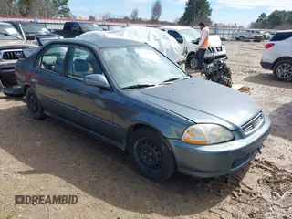 1998 Honda Civic DX with VIN 2HGEJ6621WH621140, listed as a IAAI auction lot 41615910 with 166,631 mi miles. Bid and sale history available at carsss.com. Image 1.