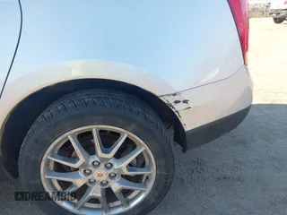 2013 Cadillac SRX Performance Collection z VIN 3GYFNHE33DS540108, wystawiony jako IAAI lot #42061957 z przebiegiem 182 797 mil mil oraz . Historia ofert i sprzedaży dostępna na DreamBid. Obrazek 6.