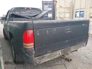 1998 Dodge Dakota SLT z VIN 1B7FL26X5WS635679, wystawiony jako IAAI lot #41688137 z przebiegiem 269 908 mil mil oraz . Historia ofert i sprzedaży dostępna na DreamBid. Obrazek 3.
