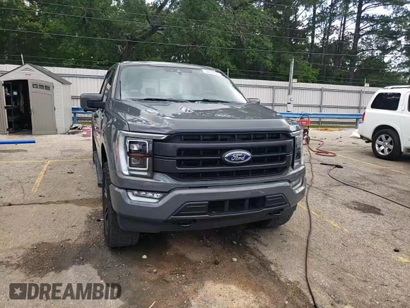 2021 Ford F-150 XL with VIN 1FTFW1ED0MFC98028, listed as a Copart auction lot 56652825 with 100,062 mi miles and Salvage title. Bid and sale history available at DreamBid. Image 13.