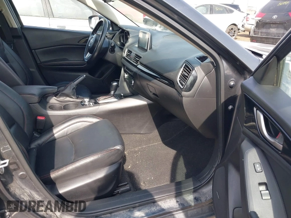 2014 Mazda 3 i Grand Touring with VIN JM1BM1M74E1212699, listed as a IAAI auction lot 41804428 with 195,472 mi miles and . Bid and sale history available at DreamBid. Image 5.