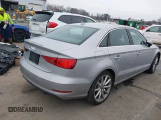 2015 Audi A3 Premium Plus z VIN WAUCCGFFXF1020409, wystawiony jako IAAI lot #41534468 z przebiegiem 116 708 mil mil oraz . Historia ofert i sprzedaży dostępna na DreamBid. Obrazek 4.