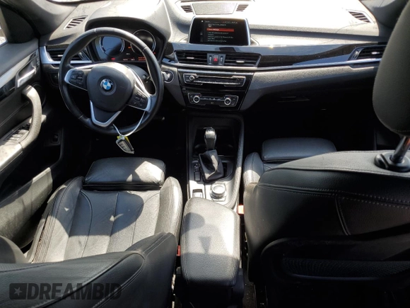 2018 BMW X1 sDrive28i with VIN WBXHU7C32J5L07666, listed as a Copart auction lot 54173465 with 132,514 mi miles and Clean Title. Bid and sale history available at DreamBid. Image 8.