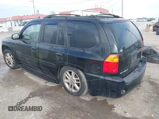 2008 GMC Envoy Denali with VIN 1GKET63M082187436, listed as a IAAI auction lot 41726422 with 195,918 mi miles. Bid and sale history available at carsss.com. Image 3.