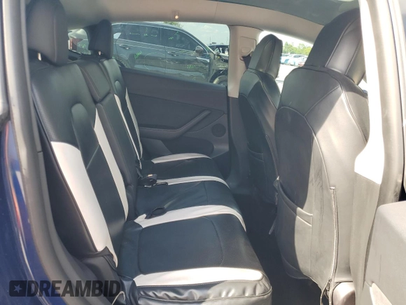 2022 Tesla Model Y Long Range with VIN 7SAYGAEE2NF390507, listed as a Copart auction lot 50986965 with 48,027 mi miles and Non Repairable. Bid and sale history available at DreamBid. Image 11.