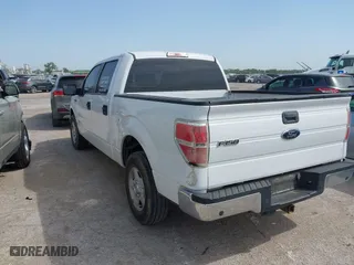 2013 Ford F-150 XL with VIN 1FTFW1CT0DFA75076, listed as a IAAI auction lot 41994432 with 490,261 mi miles. Bid and sale history available at carsss.com. Image 3.