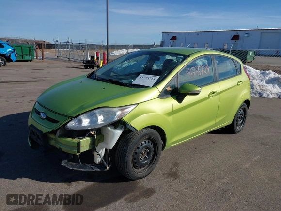 2013 Ford Fiesta SE with VIN 3FADP4EJ2DM162551, listed as a IAAI auction lot 41775724 with 166,750 mi miles. Bid and sale history available at carsss.com. Image 2.