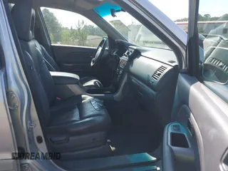 2004 Honda Pilot EX with VIN 2HKYF18504H556213, listed as a IAAI auction lot 42137221 with 225,781 mi miles and . Bid and sale history available at DreamBid. Image 5.