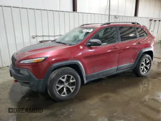 2015 Jeep Cherokee Trailhawk with VIN 1C4PJMBB8FW576765, listed as a Copart auction lot 49097925 with 299,877 mi miles and Clean Title. Bid and sale history available at carsss.com. Image 1.