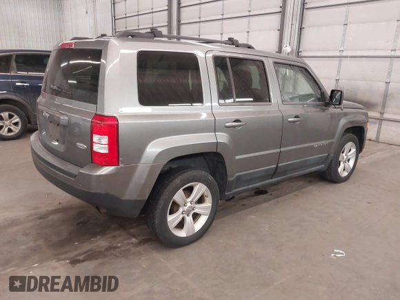 2011 Jeep Patriot Latitude with VIN 1J4NT1GB4BD288377, listed as a IAAI auction lot 41773432 with 194,021 mi miles and . Bid and sale history available at carsss.com. Image 4.