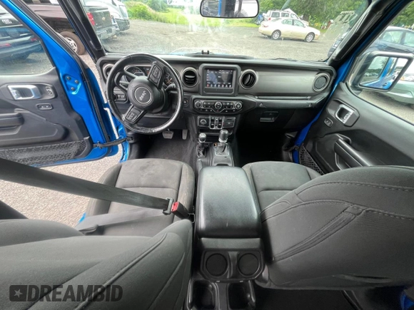 2021 Jeep Gladiator 80th Anniversary с VIN 1C6HJTAG8ML520827, выставлен на аукционе Copart как лот 63643585 с пробегом 128 279 миль миль и Чистый • Clean title. История ставок и продаж доступна на DreamBid. Изображение 5.