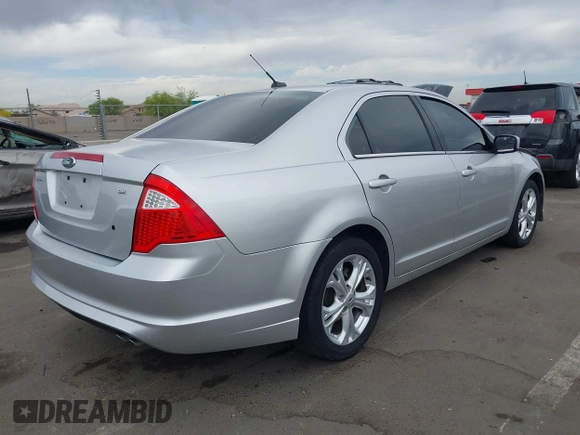 2012 Ford Fusion SE with VIN 3FAHP0HA3CR291485, listed as a IAAI auction lot 42029338 with 153,217 mi miles and . Bid and sale history available at DreamBid. Image 4.