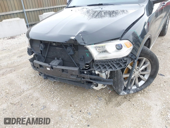 2018 Dodge Durango SXT with VIN 1C4RDJAG1JC218378, listed as a IAAI auction lot 41955407 with 71,022 mi miles and . Bid and sale history available at DreamBid. Image 6.