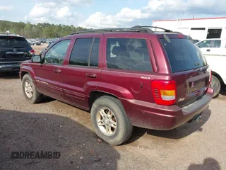 1999 Jeep Grand Cherokee Limited with VIN 1J4GW68N8XC595697, listed as a IAAI auction lot 41917466 with 177,944 mi miles. Bid and sale history available at carsss.com. Image 3.