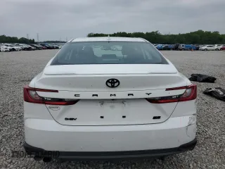 2025 Toyota Camry LE z VIN 4T1DAACK6SU025512, wystawiony jako Copart lot #54516175 z przebiegiem 11 046 mil mil oraz Czysty tytuł • Clean title. Historia ofert i sprzedaży dostępna na DreamBid. Obrazek 6.