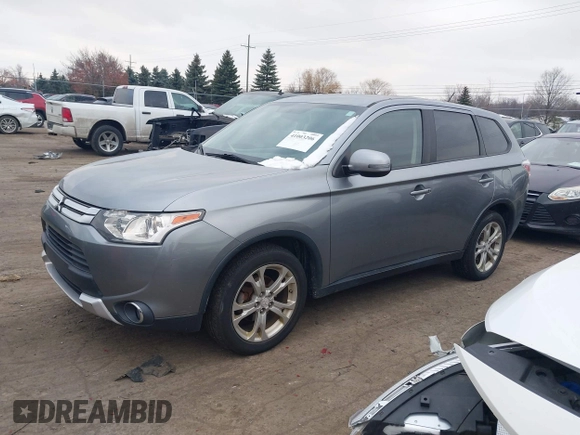 2015 Mitsubishi Outlander SE with VIN JA4AZ3A39FZ007936, listed as a IAAI auction lot 41003206 with 136,017 mi miles and . Bid and sale history available at DreamBid. Image 2.