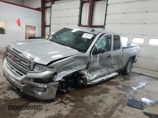 2018 GMC Sierra 1500 SLE z VIN 1GTV2MEH8JZ357073, wystawiony jako IAAI lot #41642234 z przebiegiem 105 007 mil mil oraz . Historia ofert i sprzedaży dostępna na DreamBid. Obrazek 2.