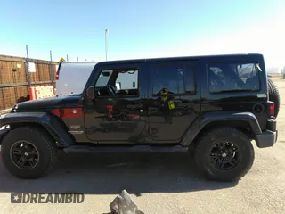 2015 Jeep Wrangler Unlimited Sahara with VIN 1C4BJWEG0FL568237, listed as a IAAI auction lot 41697726 with 82,751 mi miles. Bid and sale history available at carsss.com. Image 14.