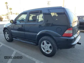 2001 Mercedes-Benz M-Class AMG with VIN 4JGAB74E71A223107, listed as a Copart auction lot 85156594 with 184,928 mi miles and Salvage Title. Bid and sale history available at carsss.com. Image 2.
