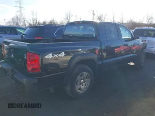 2006 Dodge Dakota SLT z VIN 1D7HW48K66S632826, wystawiony jako IAAI lot #41635407 z przebiegiem 208 046 mil mil oraz . Historia ofert i sprzedaży dostępna na DreamBid. Obrazek 4.