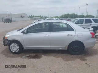 2008 Toyota Yaris with VIN JTDBT923184018720, listed as a IAAI auction lot 42038762 with 246,994 mi miles. Bid and sale history available at carsss.com. Image 15.