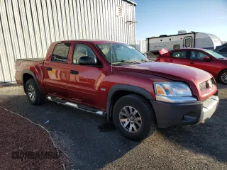 2006 Mitsubishi Raider Duro Cross z VIN 1Z7HT38N66S538442, wystawiony jako Copart lot #77142384 z przebiegiem 164 741 mil mil oraz Czysty tytuł • Clean title. Historia ofert i sprzedaży dostępna na DreamBid. Obrazek 4.