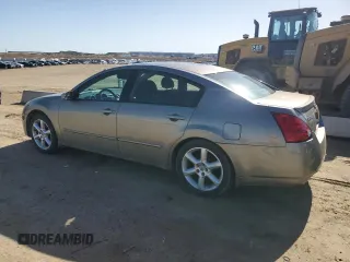 2004 Nissan Maxima SE z VIN 1N4BA41E24C877137, wystawiony jako Copart lot #52534115 z przebiegiem 219 798 mil mil oraz Szkoda całkowita • Salvage title. Historia ofert i sprzedaży dostępna na DreamBid. Obrazek 2.