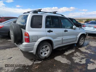 2003 Suzuki Grand Vitara z VIN JS3TD62V434104082, wystawiony jako Copart lot #57349105 z przebiegiem Nie podano mil oraz Szkoda całkowita • Salvage title. Historia ofert i sprzedaży dostępna na DreamBid. Obrazek 3.