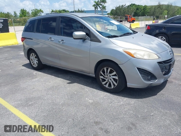 2012 Mazda 5 Sport with VIN JM1CW2BL8C0129591, listed as a IAAI auction lot 42513037 with 177,206 mi miles and . Bid and sale history available at DreamBid. Image 1.
