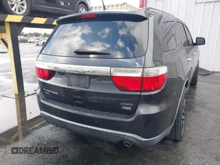 2013 Dodge Durango Crew with VIN 1C4RDJDG3DC675676, listed as a IAAI auction lot 41765289 with 140,626 mi miles. Bid and sale history available at carsss.com. Image 4.