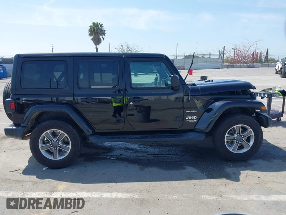 2020 Jeep Wrangler Unlimited Sahara with VIN 1C4HJXEN6LW235159, listed as a IAAI auction lot 42045083 with 68,400 mi miles and . Bid and sale history available at DreamBid. Image 13.