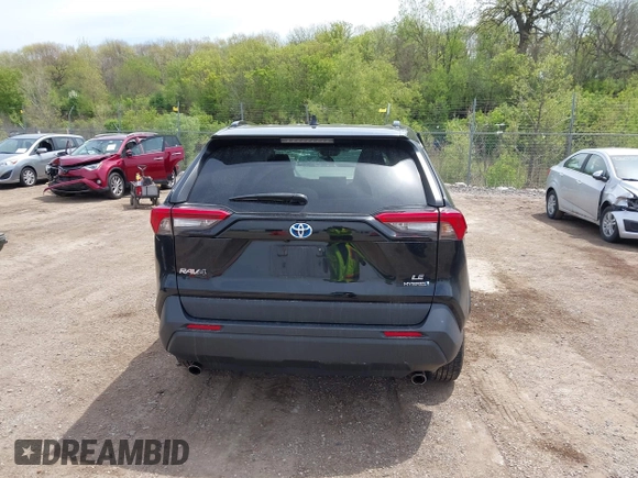 2021 Toyota RAV4 Hybrid LE with VIN 2T3L6RFV7MW011159, listed as a IAAI auction lot 42212998 with 104,626 mi miles and . Bid and sale history available at DreamBid. Image 16.