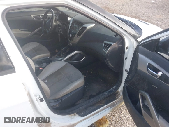 2013 Hyundai Veloster w/Gray Int with VIN KMHTC6AD4DU140121, listed as a IAAI auction lot 41410252 with 202,596 mi miles and . Bid and sale history available at DreamBid. Image 5.