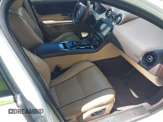 2015 Jaguar XJ with VIN SAJWA1CZ0F8V75119, listed as a IAAI auction lot 42248663 with 94,060 mi miles and . Bid and sale history available at DreamBid. Image 5.