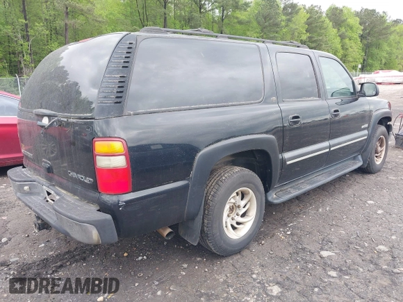 2000 Chevrolet Suburban LT with VIN 3GNFK16T0YG127485, listed as a IAAI auction lot 41957332 with 240,920 mi miles. Bid and sale history available at carsss.com. Image 4.