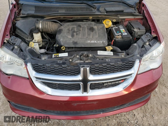 2016 Dodge Grand Caravan SXT with VIN 2C4RDGCG7GR201679, listed as a Copart auction lot 83384084 with 117,620 mi miles and Salvage Title. Bid and sale history available at DreamBid. Image 14.