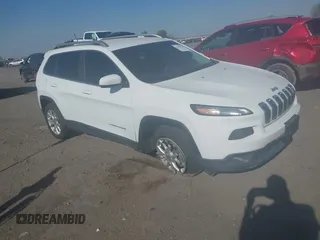 2014 Jeep Cherokee Latitude with VIN 1C4PJLCB1EW226188, listed as a IAAI auction lot 41869119 with 54,478 mi miles. Bid and sale history available at carsss.com. Image 1.