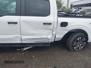 2023 Ford F-150 XL with VIN 1FTEW1EP5PFB87582, listed as a IAAI auction lot 42254015 with 10,476 mi miles and . Bid and sale history available at DreamBid. Image 6.