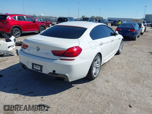 2014 BMW 6 Series 650i xDrive with VIN WBA6B4C5XED099197, listed as a IAAI auction lot 41744557 with 174,613 mi miles. Bid and sale history available at carsss.com. Image 4.
