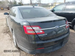 2013 Ford Taurus SEL with VIN 1FAHP2E84DG188503, listed as a IAAI auction lot 41800277 with 215,015 mi miles. Bid and sale history available at carsss.com. Image 3.