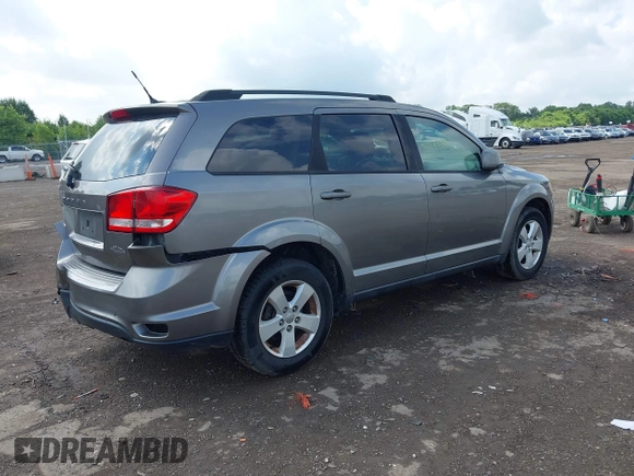 2012 Dodge Journey SXT with VIN 3C4PDDBG2CT146220, listed as a IAAI auction lot 42661371 with 103,378 mi miles and . Bid and sale history available at DreamBid. Image 4.