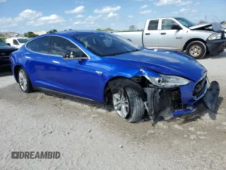 2014 Tesla Model S 60 with VIN 5YJSA1S14EFP44162, listed as a Copart auction lot 52943025 with Not Provided miles and Salvage Title. Bid and sale history available at DreamBid. Image 4.