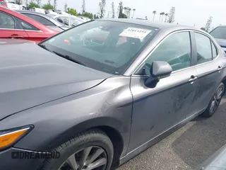 2019 Toyota Camry LE with VIN 4T1B11HK4KU254853, listed as a IAAI auction lot 42013255 with 153,664 mi miles and . Bid and sale history available at DreamBid. Image 14.