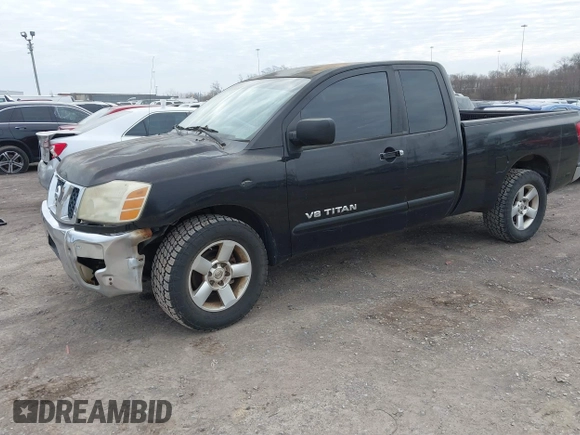 2006 Nissan Titan SE with VIN 1N6BA06A86N570617, listed as a IAAI auction lot 41613217 with 211,095 mi miles and . Bid and sale history available at DreamBid. Image 2.
