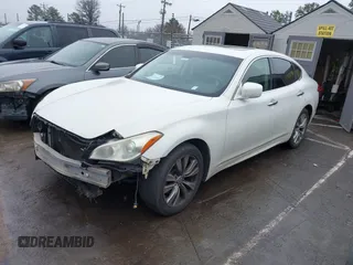 2013 Infiniti M with VIN JN1BY1AP2DM511813, listed as a IAAI auction lot 41577968 with 191,608 mi miles and . Bid and sale history available at DreamBid. Image 2.