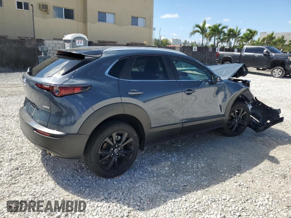 2024 Mazda CX-30 2.5 S Carbon Edition with VIN 3MVDMBCMXRM673483, listed as a Copart auction lot 46810935 with 3,047 mi miles and Salvage Title. Bid and sale history available at carsss.com. Image 3.