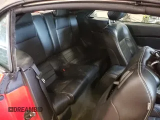 2013 Ford Mustang V6 z VIN 1ZVBP8EM2D5234080, wystawiony jako Copart lot #57939455 z przebiegiem 214 097 mil mil oraz Czysty tytuł • Clean title. Historia ofert i sprzedaży dostępna na DreamBid. Obrazek 10.
